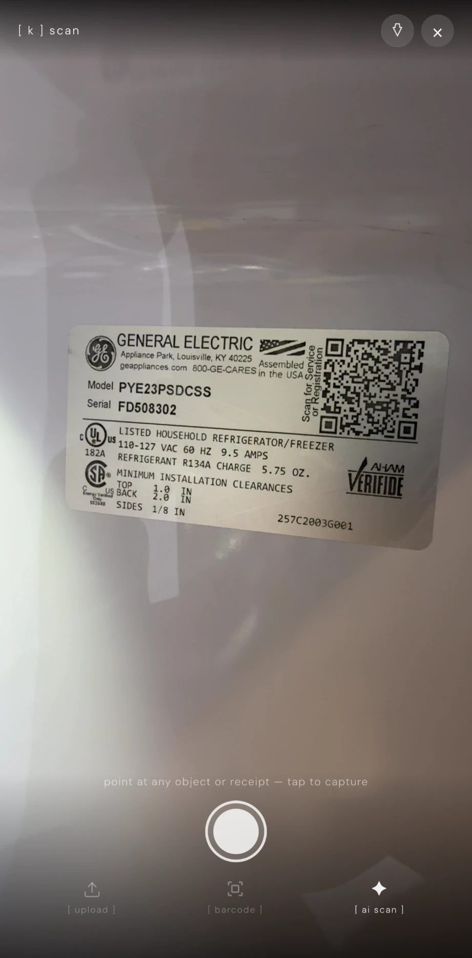 kept scanning the rating label inside a GE Profile refrigerator showing model PYE23PSDCSS and the serial number